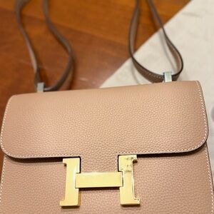 Chic Beige Crossbody Bag with Gold Accent
